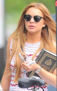28A3F7D200000578-3080683-Religious_text_Lindsay_Lohan_was_spotted_carrying_a_copy_of_the_-m-1_1431563528968
