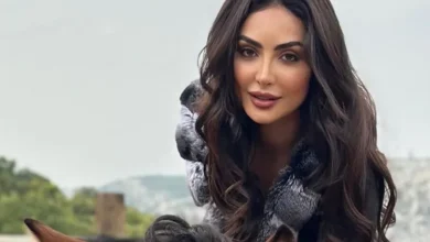صورة نور الغندور وفستان غريب في اسبوع الموضه